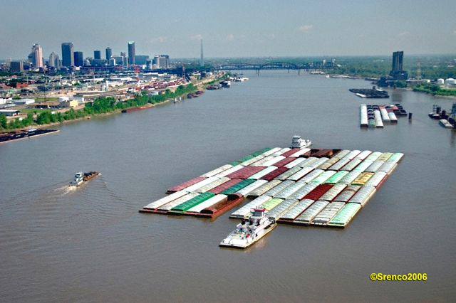 Barges near Peavy docks with Arch & Downtown St. Louis